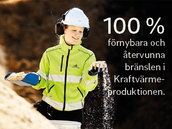 Kvinna i varselkläder bland flis